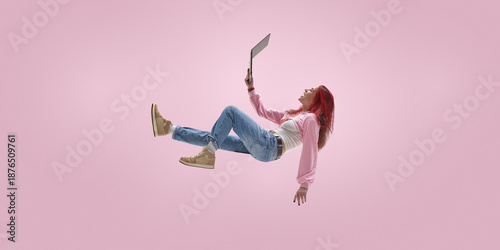 Bilde på lerret Remote freelancer floating while managing projects on laptop