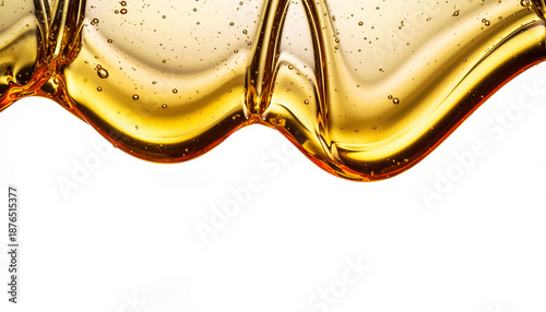 Golden Liquid Wave Close Up of Honey Texture.