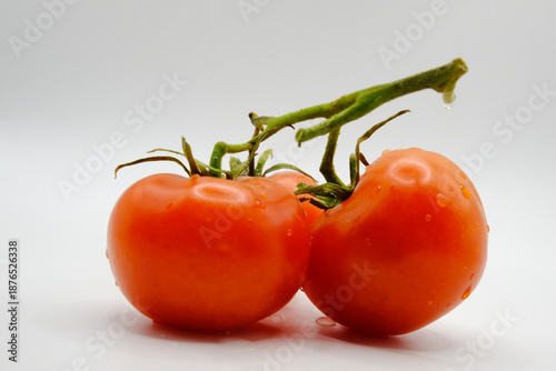 Tomato isolated on white background. Fresh red three tomato with clipping path