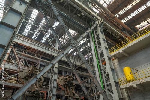 Obraz na płótnie Close up photo of steel structure support in the production workshop of a steel