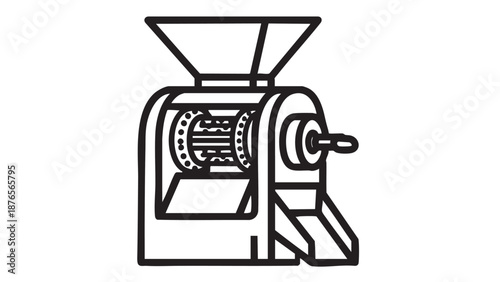 Industrial coffee grinder in operation, processing coffee beans in a factory setting viewed from the side