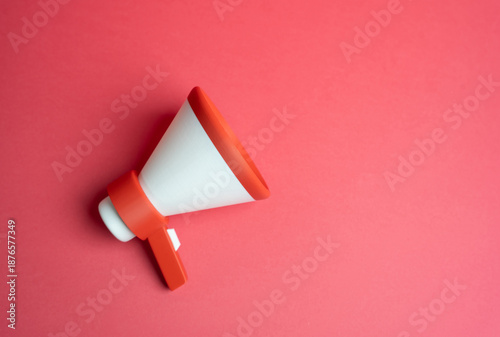 фотографія Megaphone on a red background