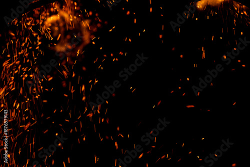A black background with a lot of fire and smoke