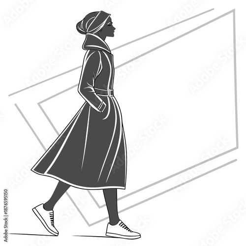 Woman in modest dress and headscarf walking in black and white