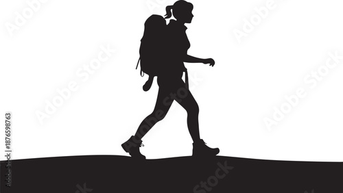 Silhouette of a person hiking with a backpack walking