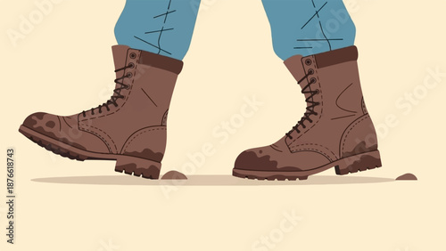 Close-up of muddy brown combat boots worn with blue jeans, stepping on dirt