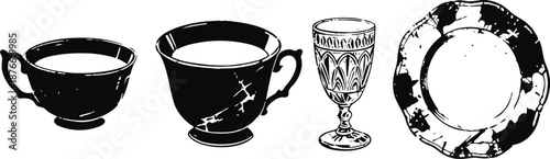 Vintage black and white silhouette of two teacups, a goblet, and a decorative plate