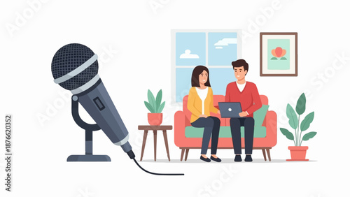 Couple recording a podcast on a couch with a microphone and laptop