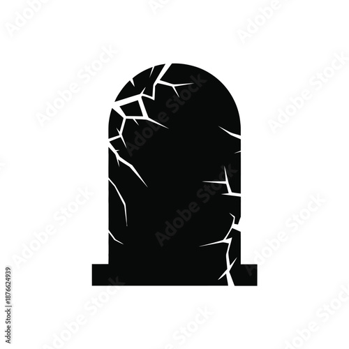 A cracked and broken tombstone a stark symbol of mortality