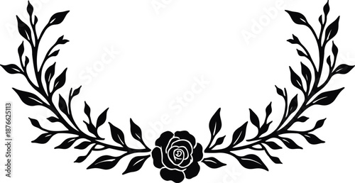 Decorative floral wreath with elaborate leaves and central rose design in black silhouette