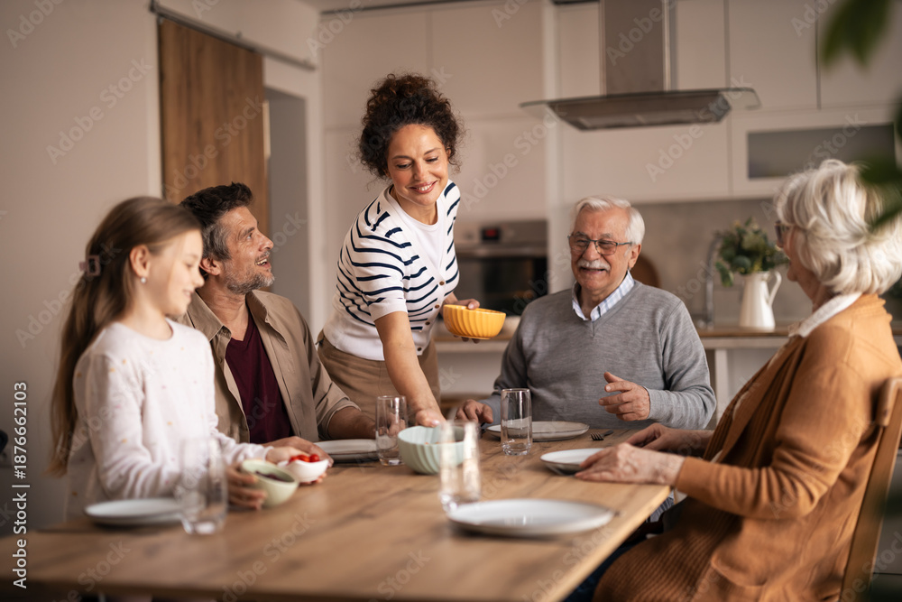 Fototapeta premium Family enjoying lunch together at home