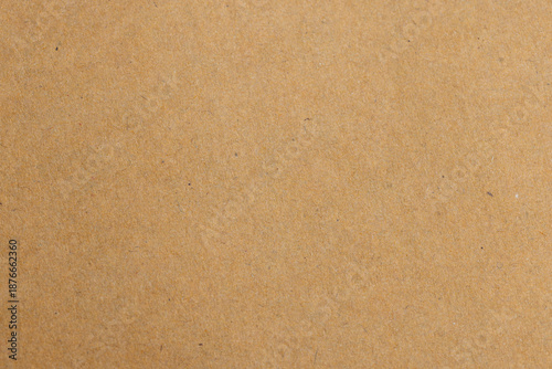 Brown Kraft Paper Texture Background with Natural Fiber Details,Macro shot of recycled brown kraft paper texture background. High-quality organic paper surface with visible natural fibers, perfect,