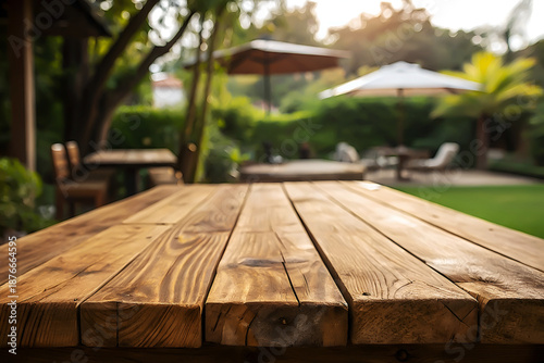 Natural Wood Table Surface in Lush Garden Setting.