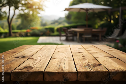 Outdoor Wooden Tabletop with Soft Focus Garden Background.