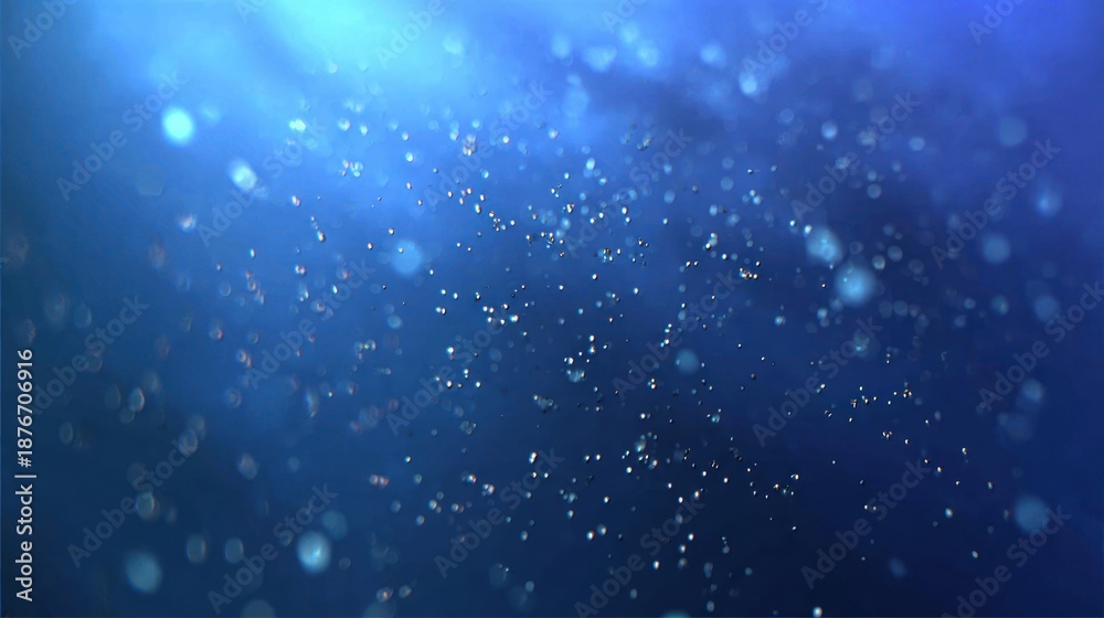 Fototapeta premium Abstract, blurred, and sparkling blue background, light rays, and bokeh effect