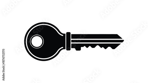 a black and white image of an old key