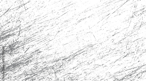 Abstract distressed grunge texture with random gray scratches and speckles on a white background creating a weathered and aged surface effect