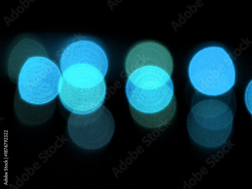 Glowing blue lights in dark background