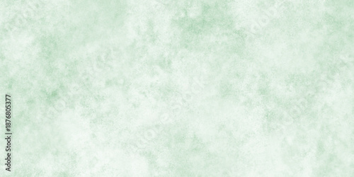 Abstract Elegant dark green background with mottled vintage texture in old fancy background design, texture of colored parchment paper.