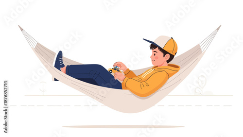 Boy Relaxing In Hammock Playing With Toy Car During Leisure Time