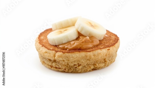 Mini vegan glutenfree pancake with peanut butter and banana slices on white background