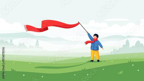 Enthusiastic Boy Waving Red Flag on Green Field During Windy Day