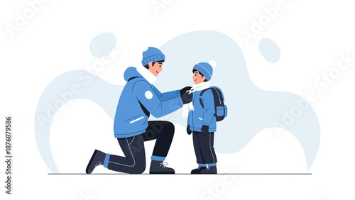 Father Tying Scarf On His Son Before School During Winter Season