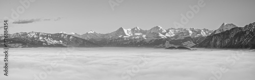 Panorama of the Swiss alps over the fog