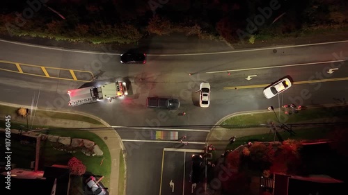 Top View Law Enforcement And Emergency Crews Respond To Night Road Accident In Beechville Halifax Nova Scotia Canada With Vehicles And Safety Lights. Aerial view