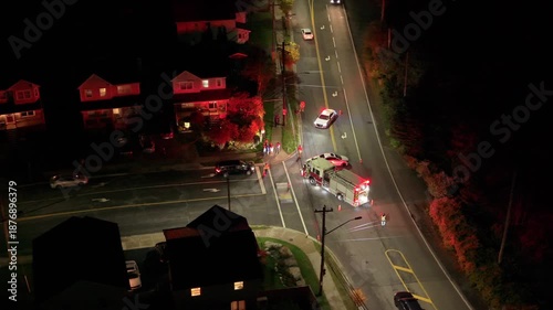 Aerial view Serious Nighttime Traffic Incident In Beechville Near Halifax Nova Scotia Canada With Police, Firefighters, And Vehicle Recovery In Progress.