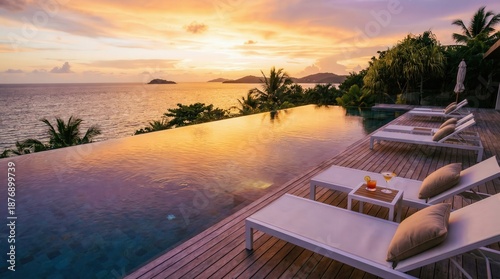 Infinity Pool Paradise: An infinity pool merges seamlessly with the tranquil ocean, creating a serene and luxurious escape under a vibrant sunset sky. Capturing the essence of a dream vacation.