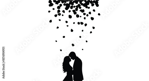 Silhouetted couple embracing under a shower of falling hearts, symbolizing love and romance