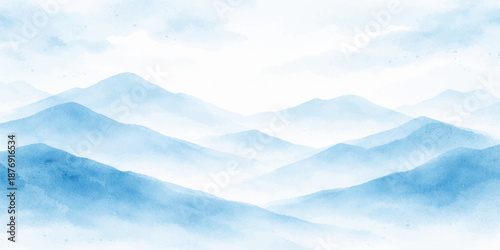 A beautiful aerial view of a white cloud landscape over snowy mountains under a bright blue sky with light mist and winter fog