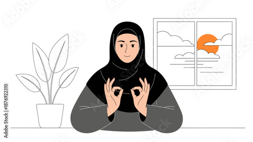 Woman Wearing Hijab Meditating Peacefully Indoor.