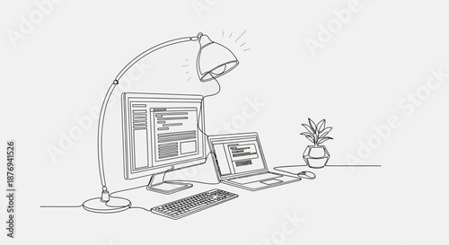 Desk Setup with Computer and Lamp.