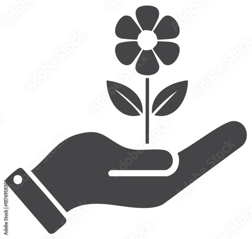 Caring hand holds growing plant symbolizing nurturing and new beginnings