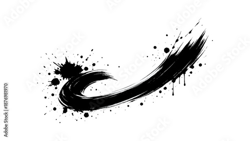 Abstract black ink brush stroke on white background with splatter effect