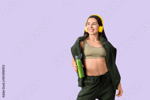 Young woman in khaki sports...