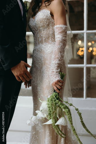 close up of bride holding bouquet