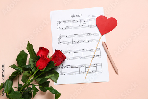 Music sheets with rose flow...