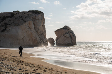 Fotobehang Cyprus Wandelaar op Aphrodite strand Paphos  © Michalis Palis