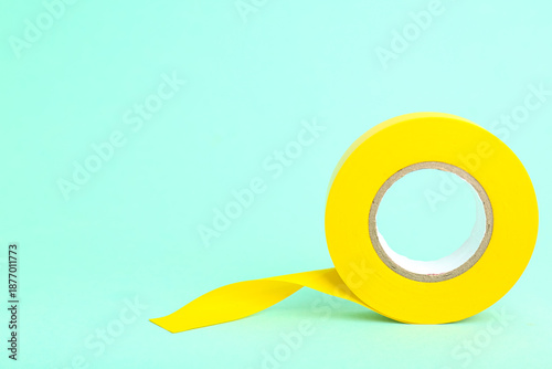 Yellow insulating tape roll...