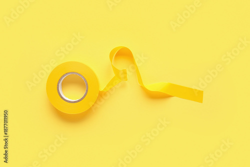 Yellow insulating tape roll...