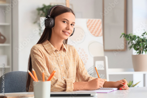 Teenage girl with headphone...