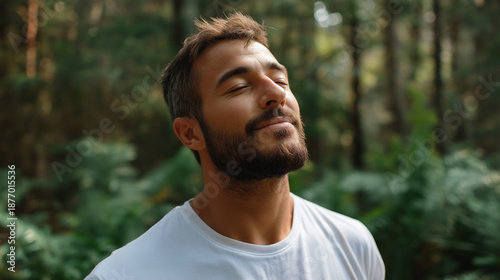 Relaxed adult man breathing fresh forest air deeply in natural woodland environment, nature meditation, outdoor stress relief, masculine wellness, environmental mindfulness, with c