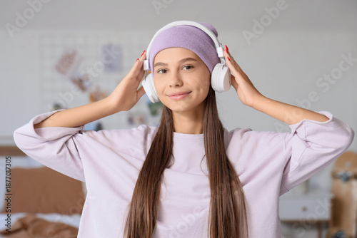 Teenage girl with headphone...