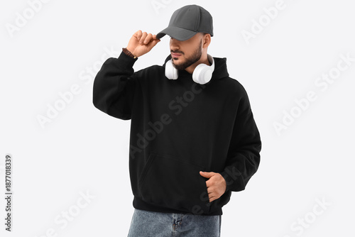 Young man in black hoodie w...