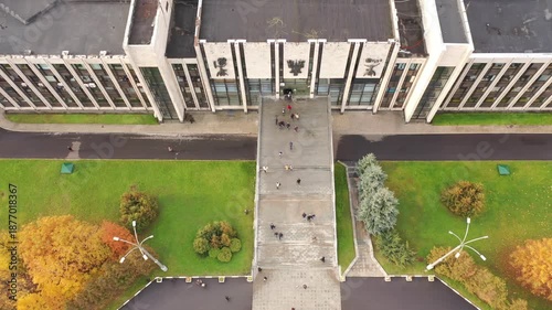 Drone pulling away from MGIMO main entrance in autumn