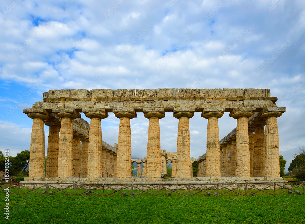 Fototapeta premium Temple of Hera in Paestum, Greek temple of Magna Graecia, the ruins of the ancient city of Paestum. UNESCO World Heritage Site, municipality of Capaccio, province of Salerno, Italy