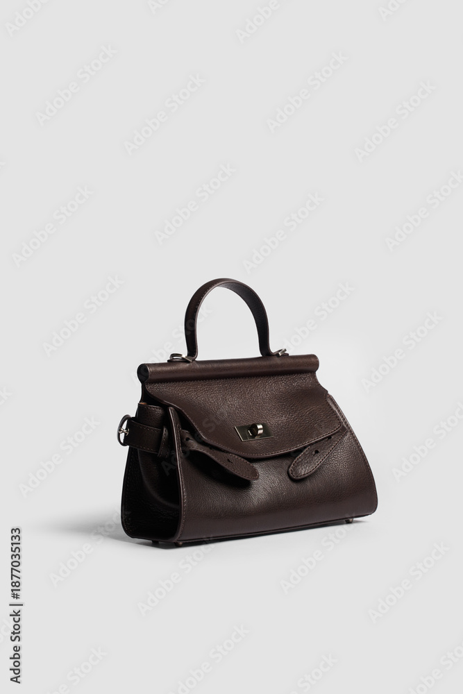 Naklejka premium Women's handbag on a white background.